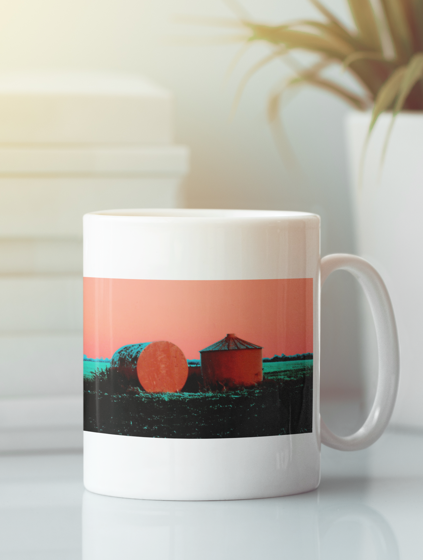 A ceramic coffee mug featuring vibrant pop art of grain silos, available in white and black colors, showcasing a unique design on both sides.