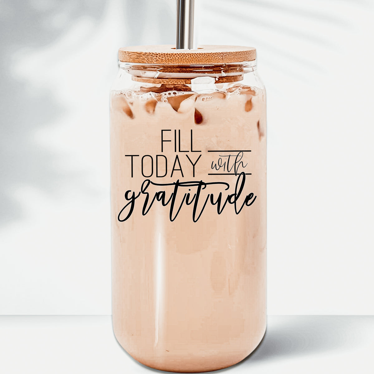 Gratitude Set featuring high borosilicate glass cups with bamboo lids and stainless steel straws, perfect for various beverages.