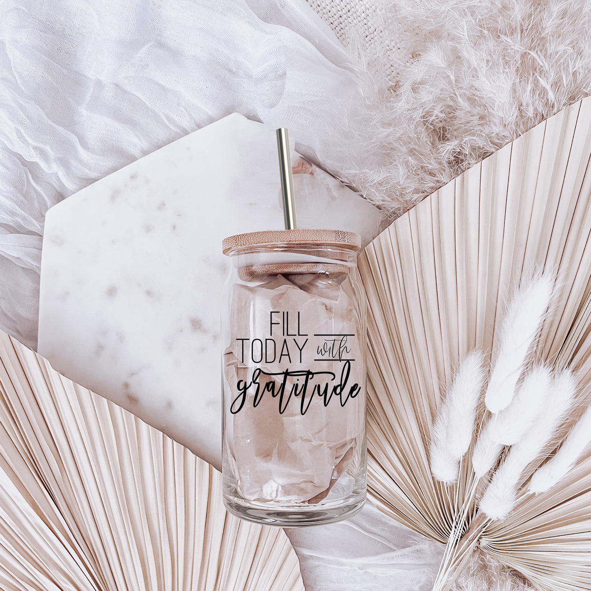 Gratitude Set featuring high borosilicate glass cups with bamboo lids and stainless steel straws, perfect for various beverages.