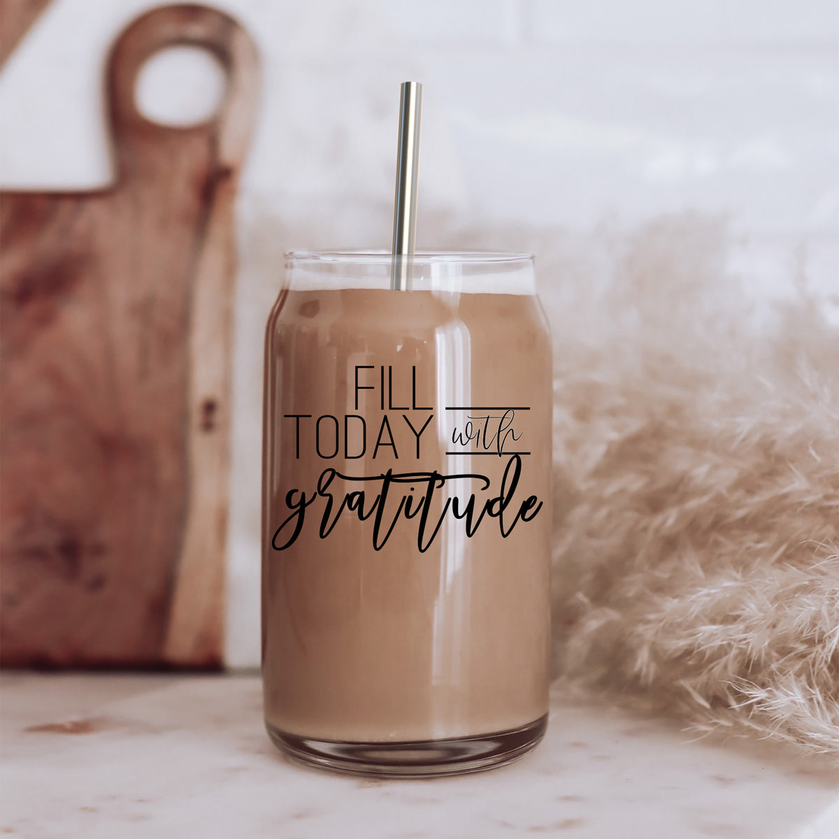 Gratitude Set featuring high borosilicate glass cups with bamboo lids and stainless steel straws, perfect for various beverages.