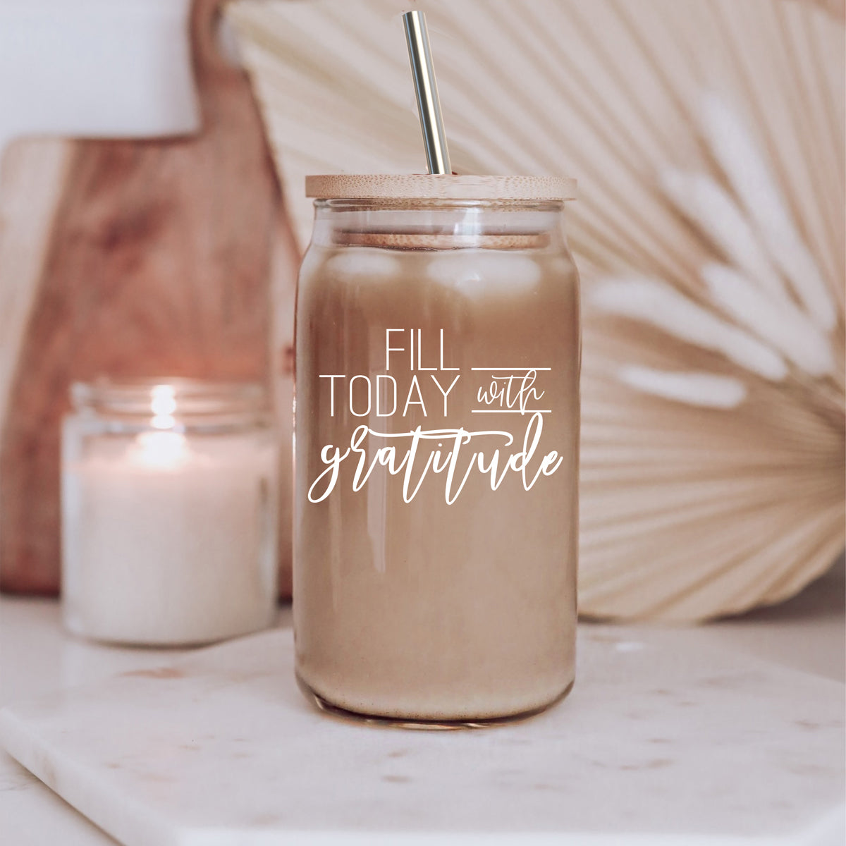 Gratitude Set featuring high borosilicate glass cups with bamboo lids and stainless steel straws, perfect for various beverages.