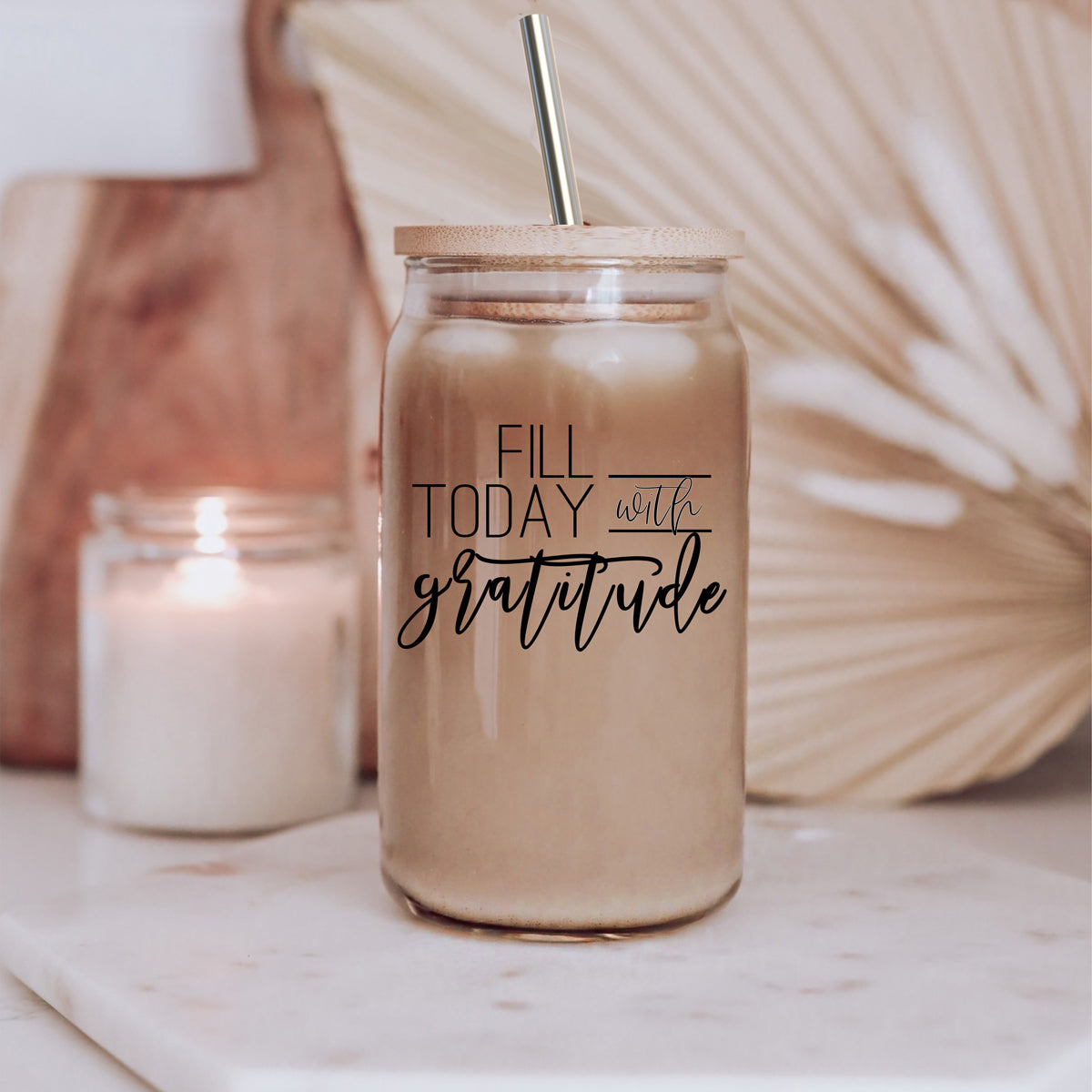 Gratitude Set featuring high borosilicate glass cups with bamboo lids and stainless steel straws, perfect for various beverages.