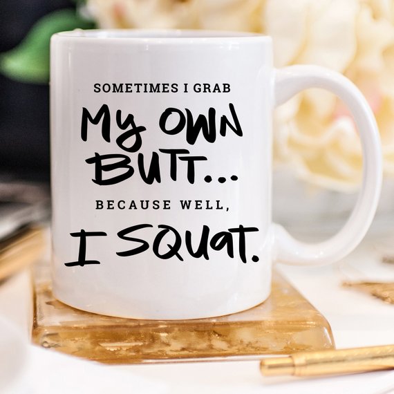 A humorous Gym Teacher Coffee Mug with the phrase 'Sometimes I Grab My Own Butt' printed on it, showcasing a fun design perfect for coffee lovers.