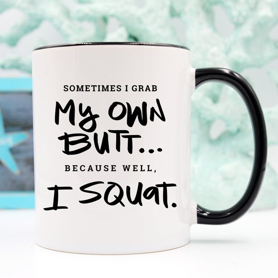 A humorous Gym Teacher Coffee Mug with the phrase 'Sometimes I Grab My Own Butt' printed on it, showcasing a fun design perfect for coffee lovers.