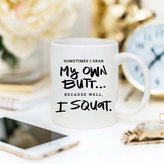 A humorous Gym Teacher Coffee Mug with the phrase 'Sometimes I Grab My Own Butt' printed on it, showcasing a fun design perfect for coffee lovers.