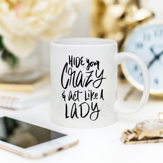 Hide Your Crazy And Act Like A Lady funny coffee mug with a humorous design, perfect for gifting.