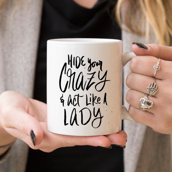 Hide Your Crazy And Act Like A Lady funny coffee mug with a humorous design, perfect for gifting.