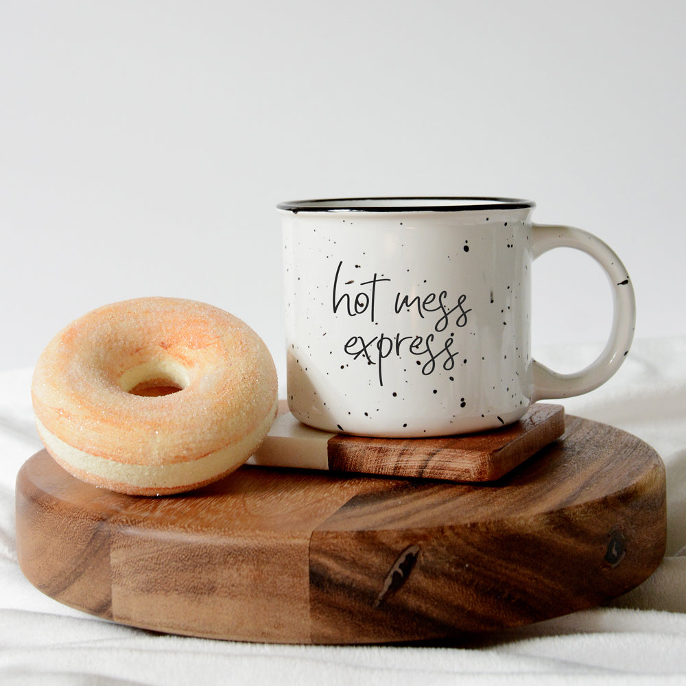 Hot Mess Express oversized campfire mug with black rim, featuring double-sided design and white sesame glaze.