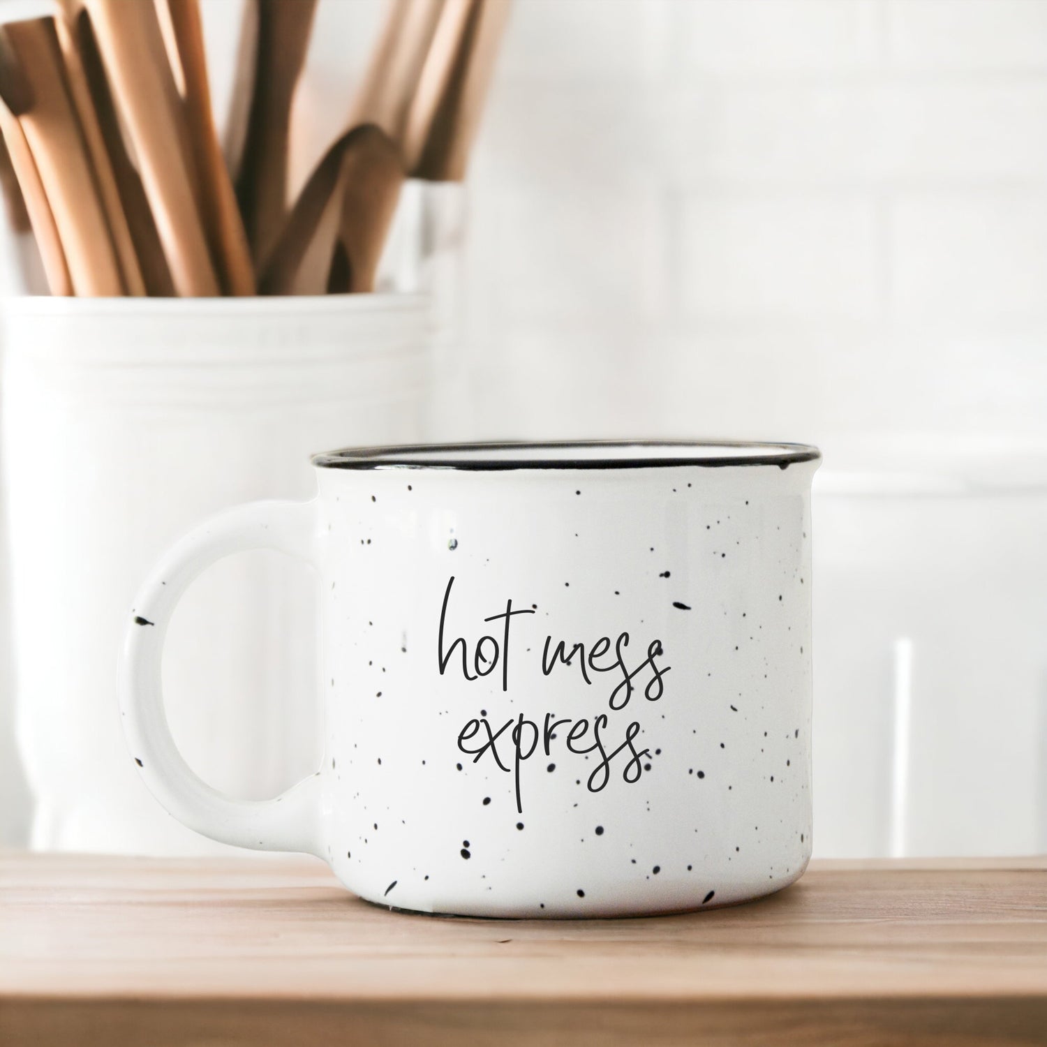 Hot Mess Express oversized campfire mug with black rim, featuring double-sided design and white sesame glaze.