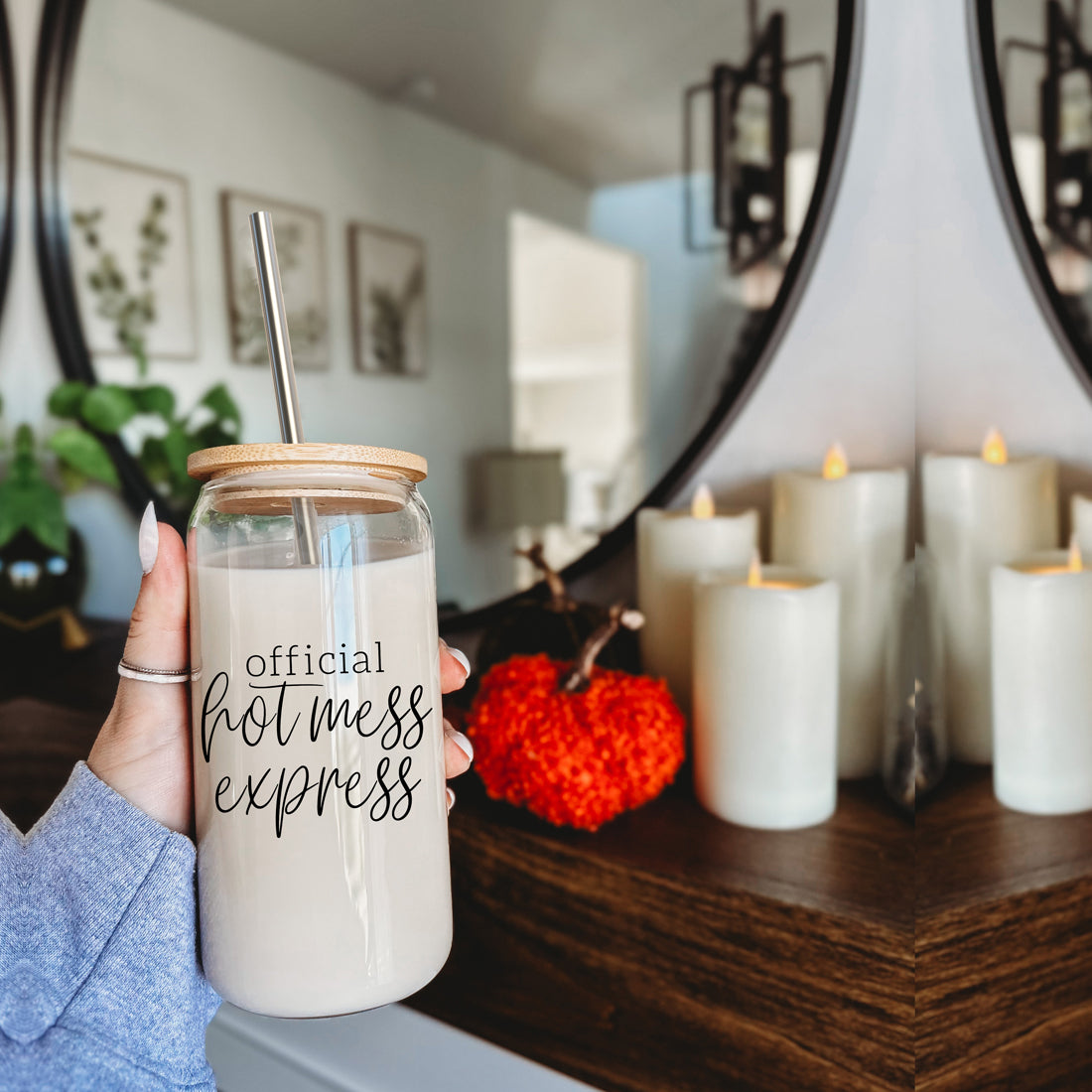 Hot Mess glass drinking cup with bamboo lid and stainless steel straws, showcasing a modern design and black graphic.