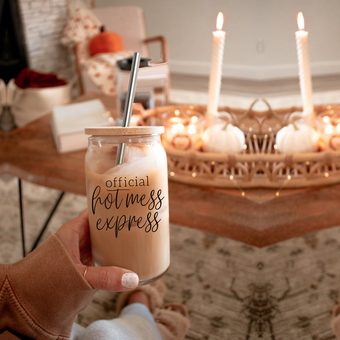 Hot Mess glass drinking cup with bamboo lid and stainless steel straws, showcasing a modern design and black graphic.