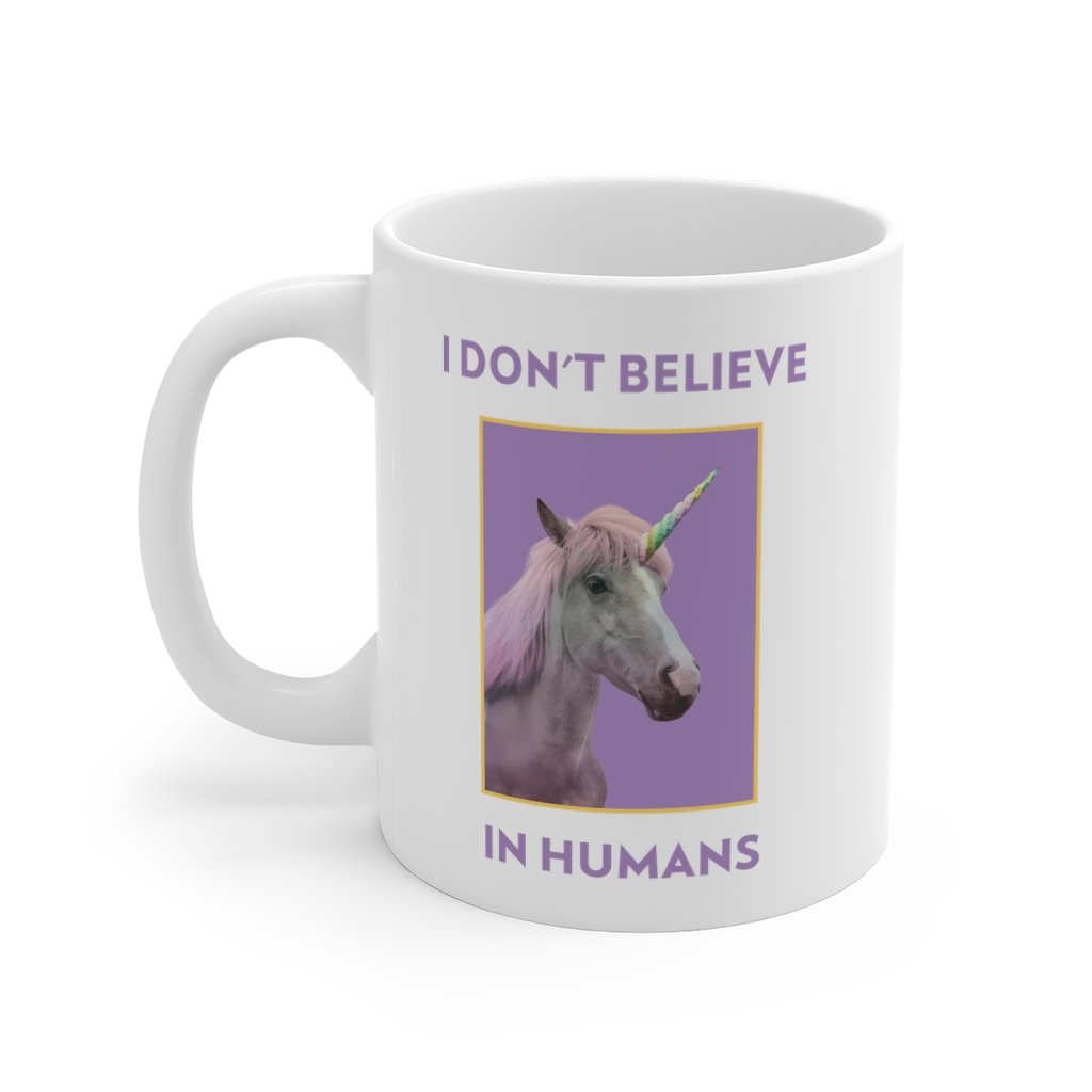 I Don't Believe in Humans Mug, white ceramic with a humorous slogan, perfect for coffee and tea.