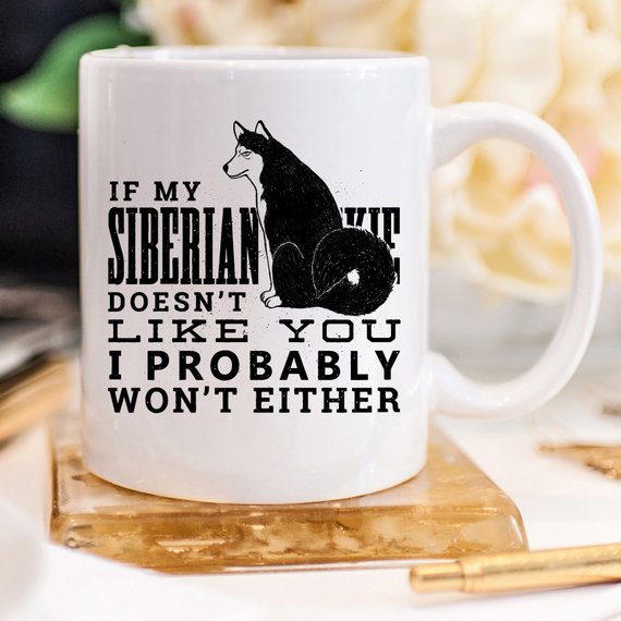 Funny coffee mug featuring a Siberian Husky design with the quote 'If My Siberian Husky Doesn't Like You, I Probably Won't Either'.