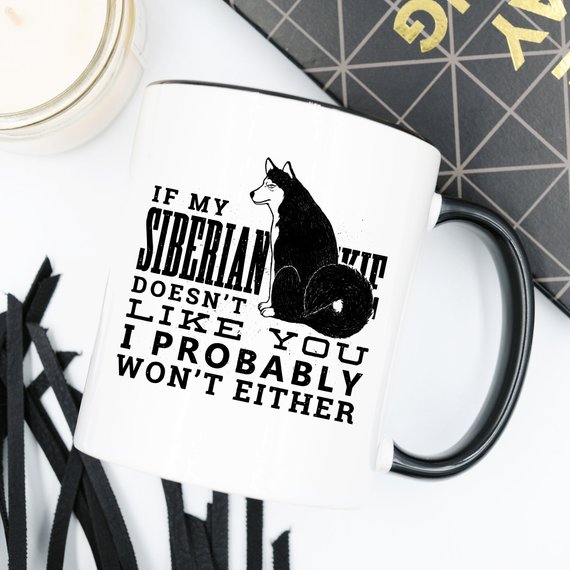 Funny coffee mug featuring a Siberian Husky design with the quote 'If My Siberian Husky Doesn't Like You, I Probably Won't Either'.