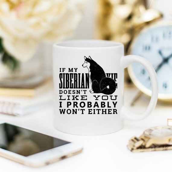 Funny coffee mug featuring a Siberian Husky design with the quote 'If My Siberian Husky Doesn't Like You, I Probably Won't Either'.