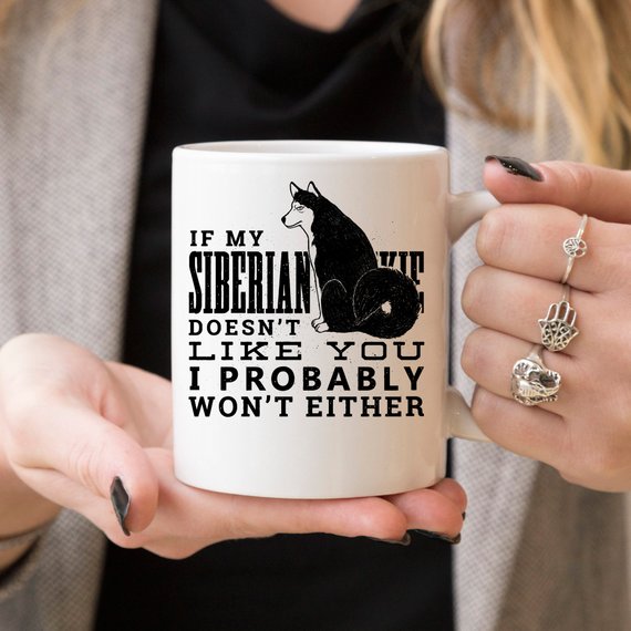 Funny coffee mug featuring a Siberian Husky design with the quote 'If My Siberian Husky Doesn't Like You, I Probably Won't Either'.