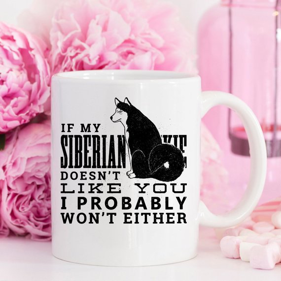 Funny coffee mug featuring a Siberian Husky design with the quote 'If My Siberian Husky Doesn't Like You, I Probably Won't Either'.