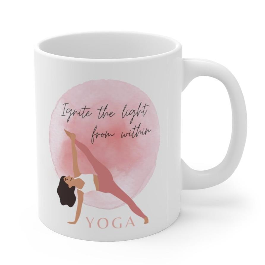 Ignite the Light Yoga Theme Mug, white ceramic, 11-ounce size, featuring a yoga-inspired design.