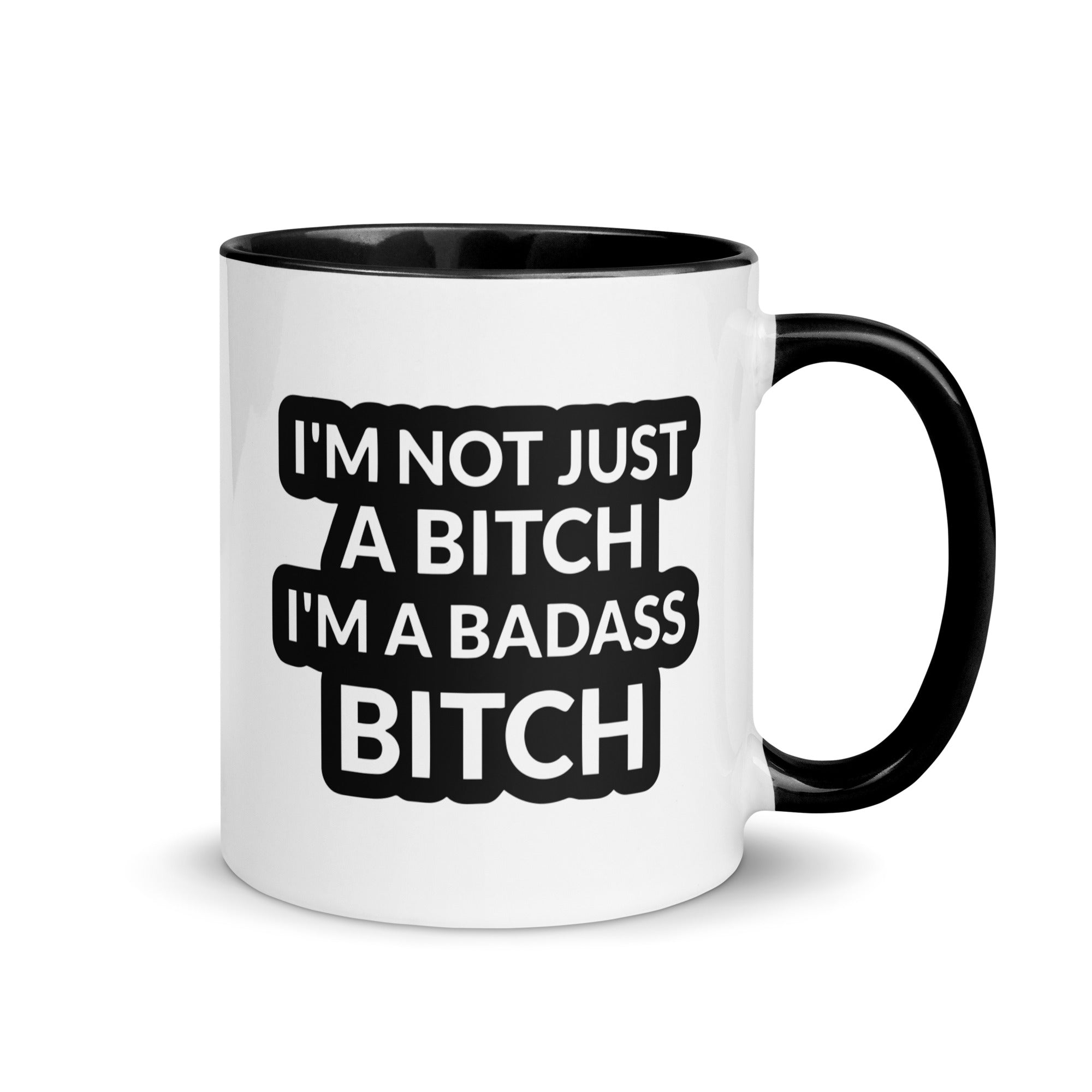 Ceramic mug with colorful rim and handle featuring the quote 'I'm Not Just A Bitch I'm A Bad Ass Bitch' in bold print.