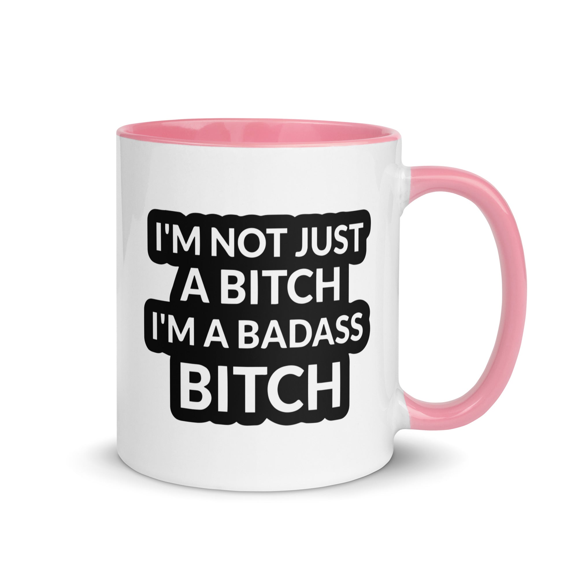 Ceramic mug with colorful rim and handle featuring the quote 'I'm Not Just A Bitch I'm A Bad Ass Bitch' in bold print.