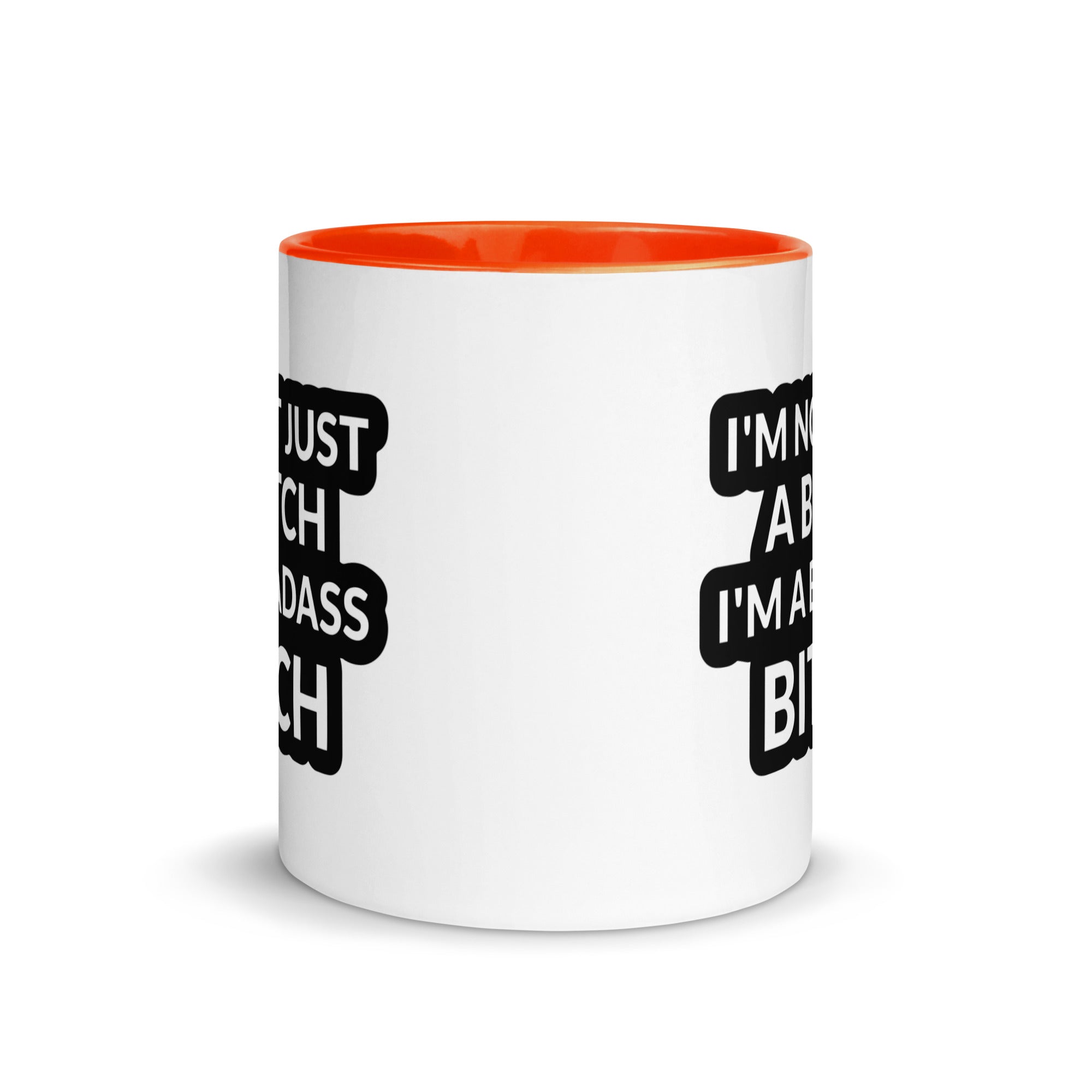 Ceramic mug with colorful rim and handle featuring the quote 'I'm Not Just A Bitch I'm A Bad Ass Bitch' in bold print.