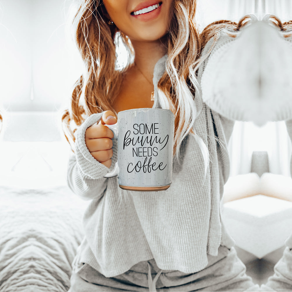 A collection of imperfect Easter mugs in pink and blue, showcasing unique designs and minor imperfections.