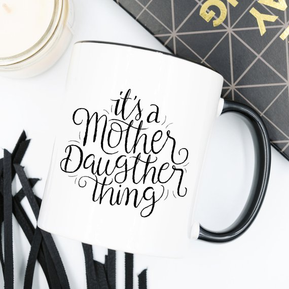 Funny coffee mug featuring a humorous design celebrating the mother-daughter relationship, made from high-quality ceramic.