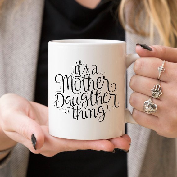 Funny coffee mug featuring a humorous design celebrating the mother-daughter relationship, made from high-quality ceramic.