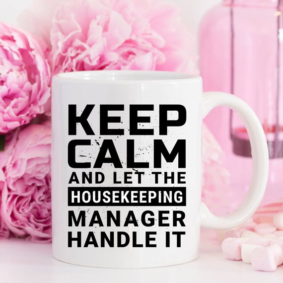 Funny coffee mug with 'Keep Calm And Let The Housekeeping Manager Handle It' design, crafted from high-quality ceramic.