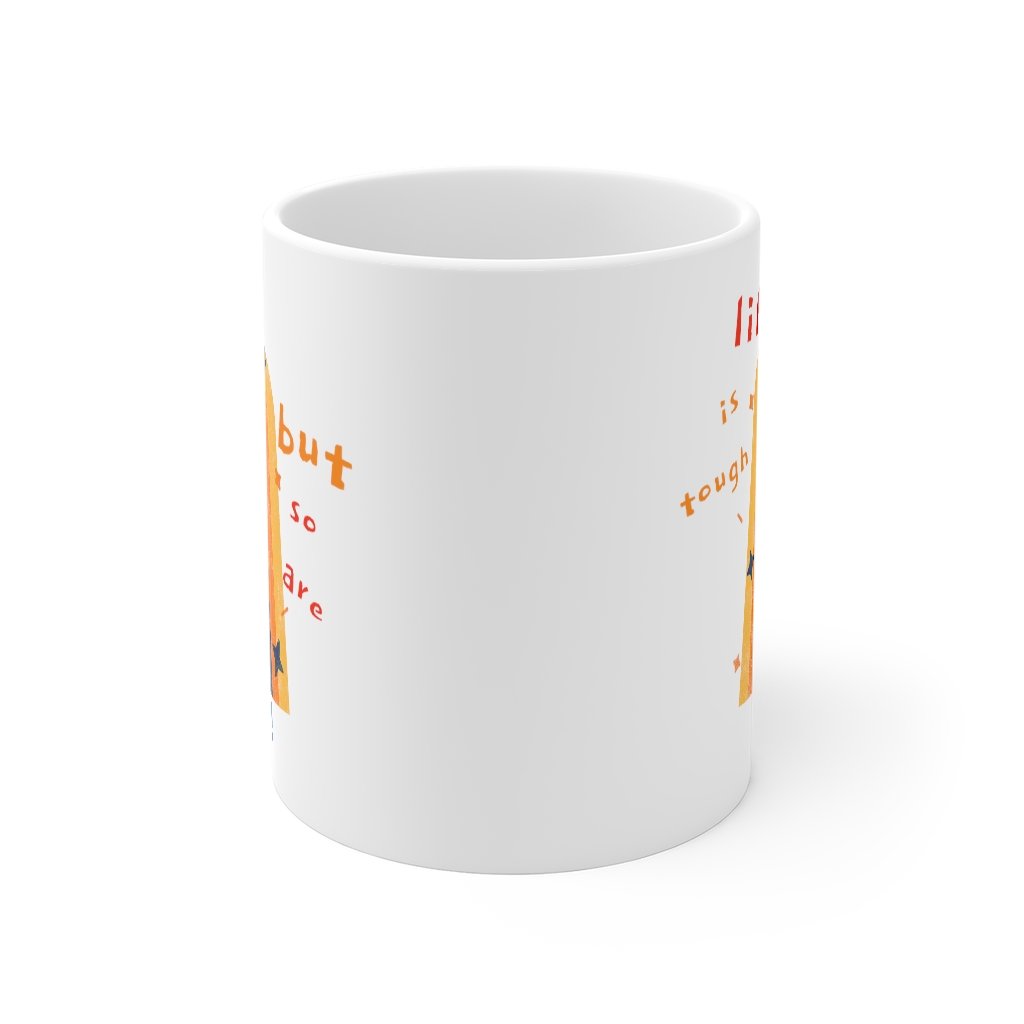 White ceramic coffee tea mug with inspirational text 'Life Is Tough, But So Are You', featuring a C-handle and rounded corners.