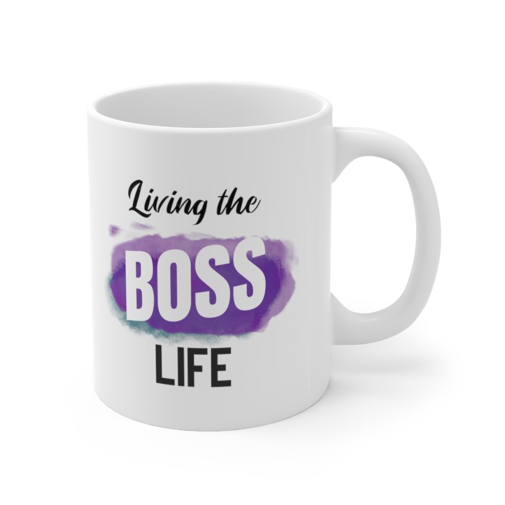 Living A Boss Life Mug made of white ceramic, featuring a motivational phrase and a comfortable C-handle.