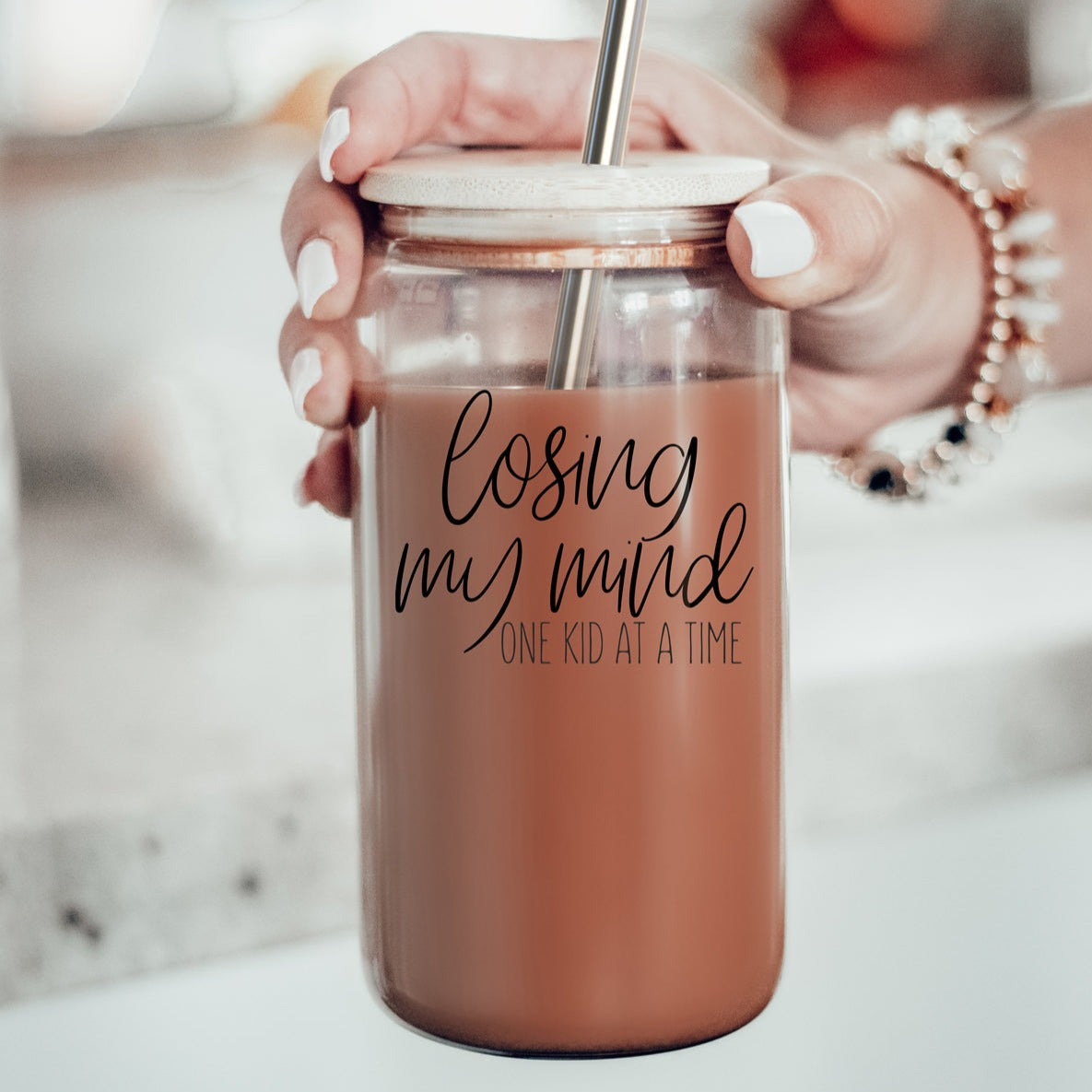 Losing My Mind Set glass drinking cups with bamboo lids and stainless steel straws, showcasing modern design and functionality.