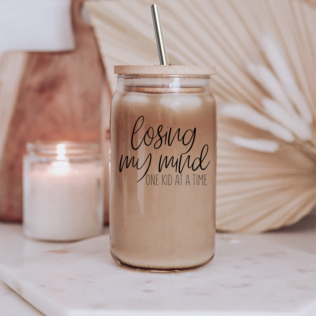 Losing My Mind Set glass drinking cups with bamboo lids and stainless steel straws, showcasing modern design and functionality.