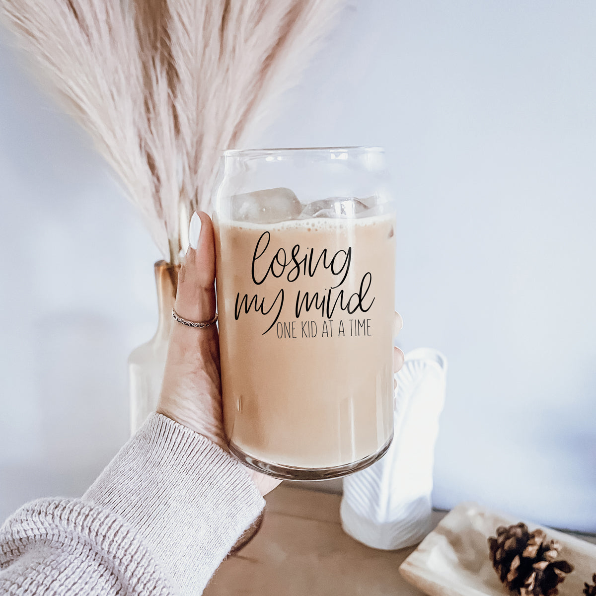 Losing My Mind Set glass drinking cups with bamboo lids and stainless steel straws, showcasing modern design and functionality.