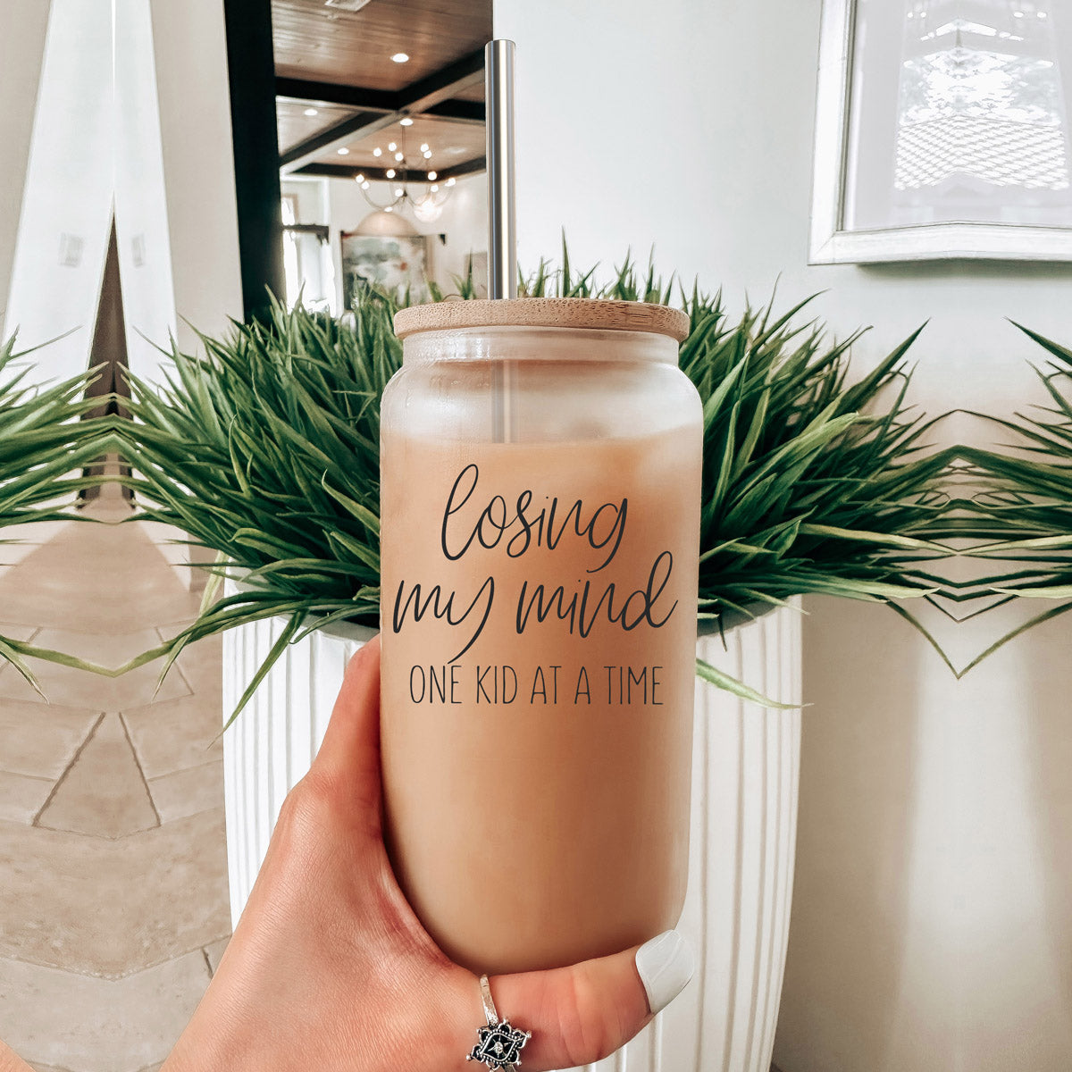 Losing My Mind Set glass drinking cups with bamboo lids and stainless steel straws, showcasing modern design and functionality.