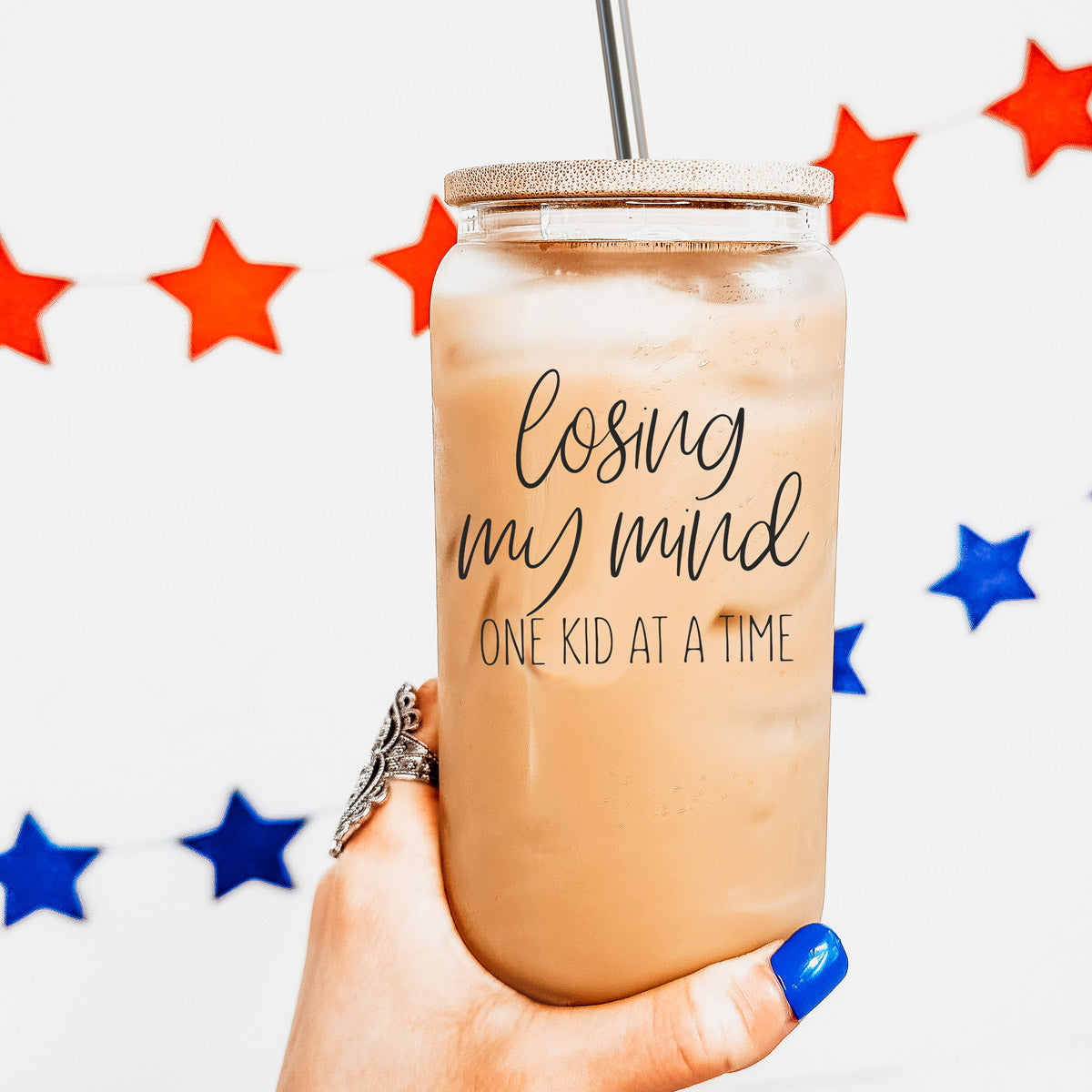 Losing My Mind Set glass drinking cups with bamboo lids and stainless steel straws, showcasing modern design and functionality.