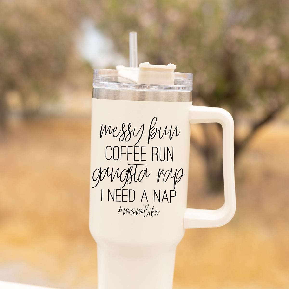 Messy Bun Mom Life 40oz insulated mug with a matte finish, featuring a black graphic design and a versatile 3-in-1 lid.