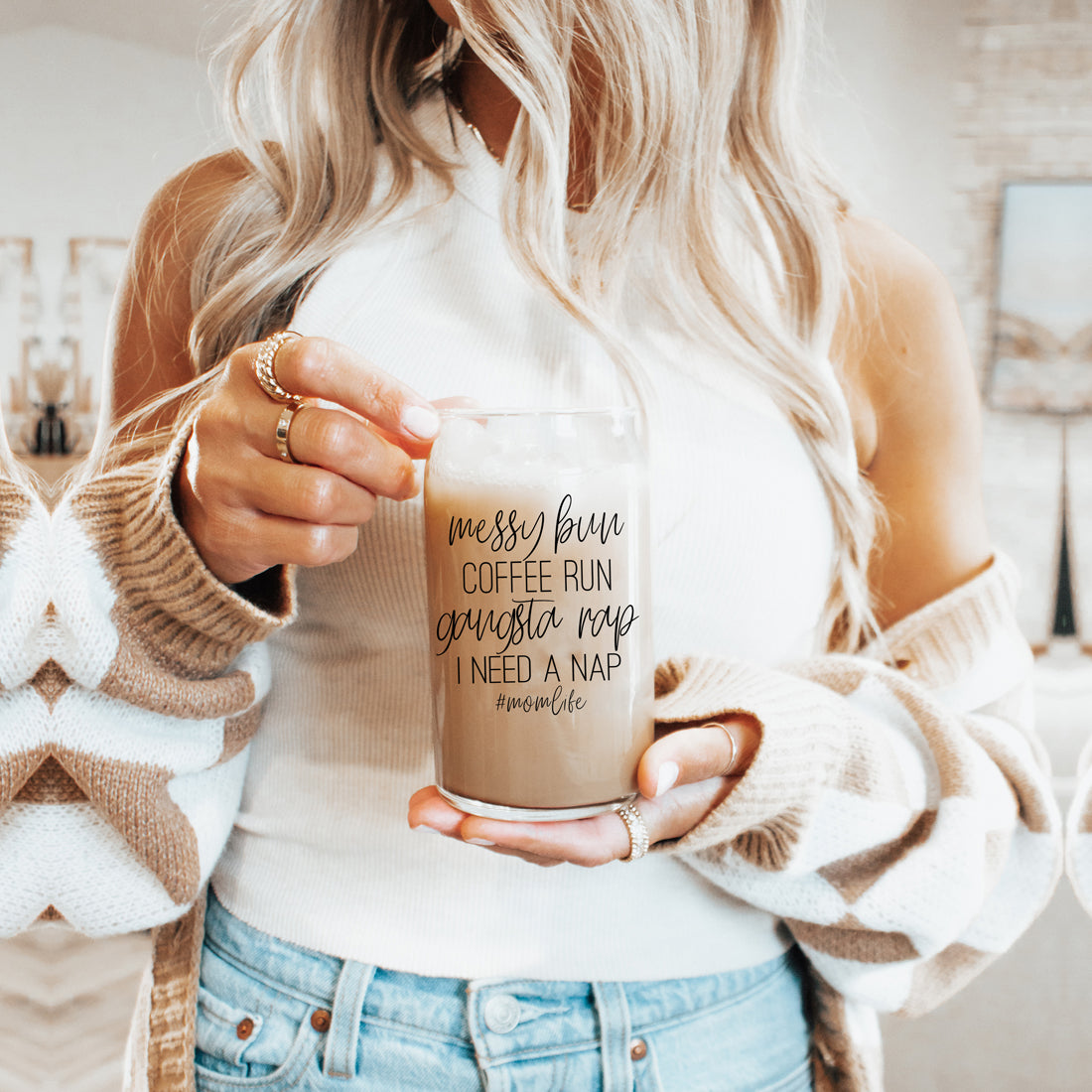 A stylish Messy Bun glass drinking cup with a bamboo lid and stainless steel straws, perfect for hot and cold beverages.