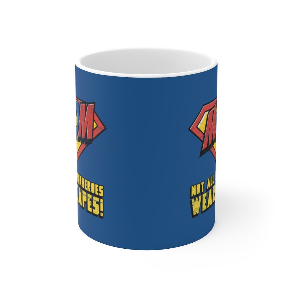 A white ceramic mug featuring the phrase 'Not All Superheroes Wear Capes' with a superhero theme, perfect for coffee or tea.