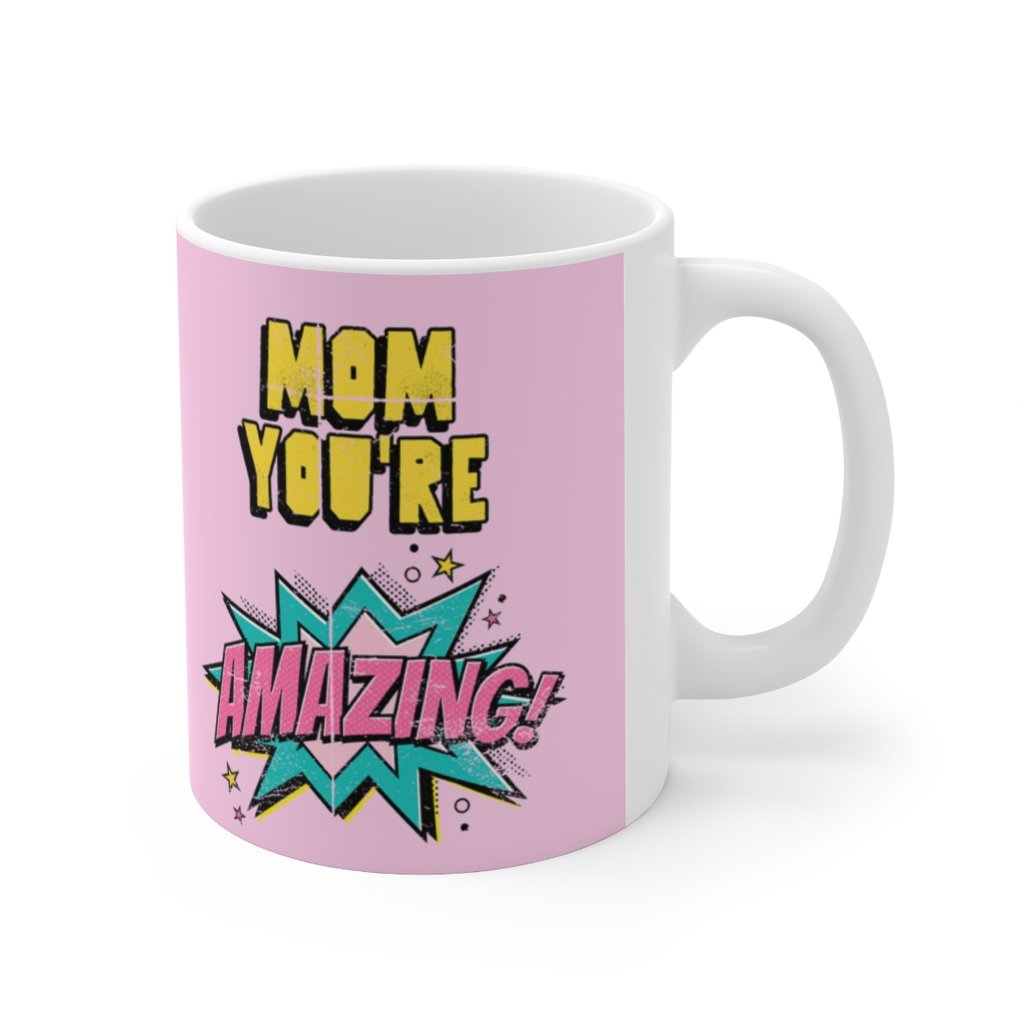 A white ceramic mug featuring a comic theme design with the text 'Mom You're Amazing' and a heartwarming message.