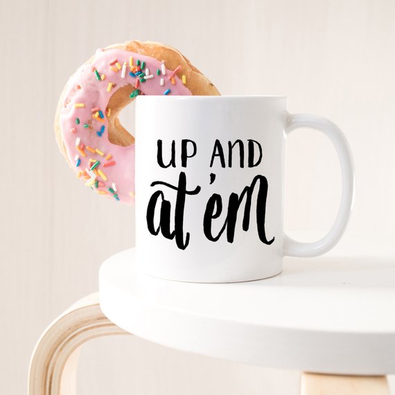 Up and At 'Em Funny Coffee Mug featuring a cheerful design, perfect for morning coffee or tea.