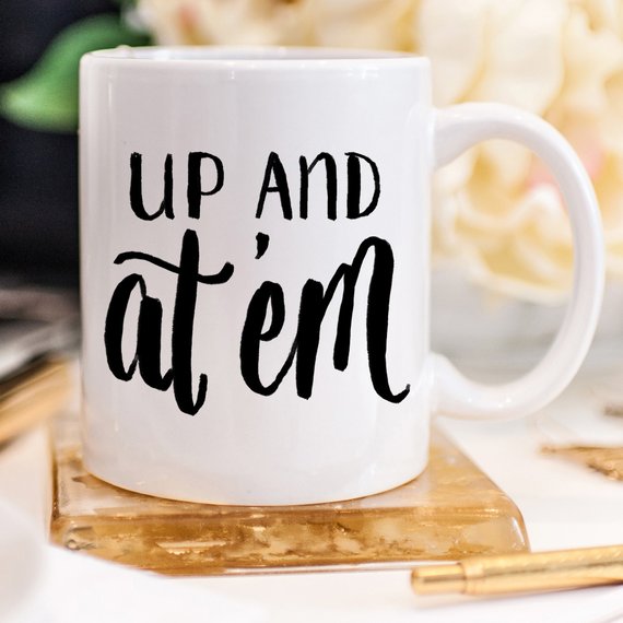 Up and At 'Em Funny Coffee Mug featuring a cheerful design, perfect for morning coffee or tea.