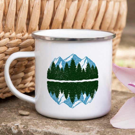 A white enamel camping mug with a stainless steel rim, featuring a vibrant design printed on both sides, perfect for outdoor adventures.