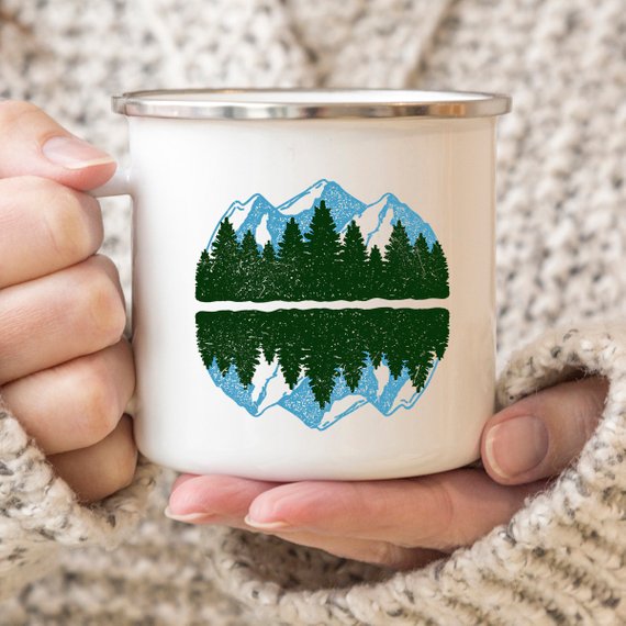 A white enamel camping mug with a stainless steel rim, featuring a vibrant design printed on both sides, perfect for outdoor adventures.