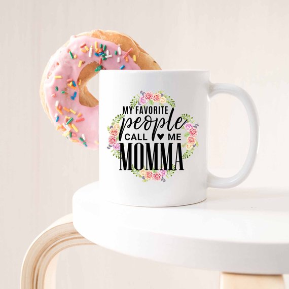 White ceramic mug with 'My Favorite People Call Me Momma' design printed on both sides, perfect for Mother's Day.