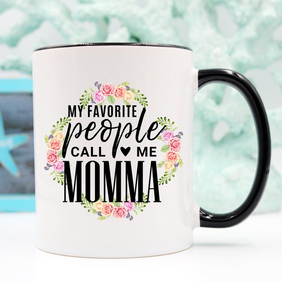 White ceramic mug with 'My Favorite People Call Me Momma' design printed on both sides, perfect for Mother's Day.