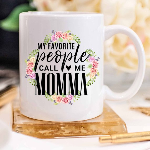 White ceramic mug with 'My Favorite People Call Me Momma' design printed on both sides, perfect for Mother's Day.