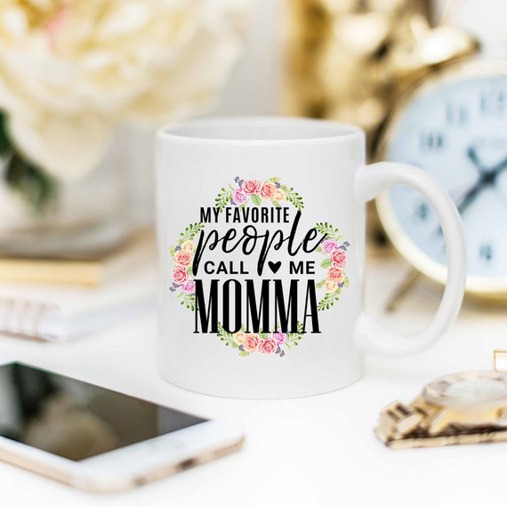 White ceramic mug with 'My Favorite People Call Me Momma' design printed on both sides, perfect for Mother's Day.