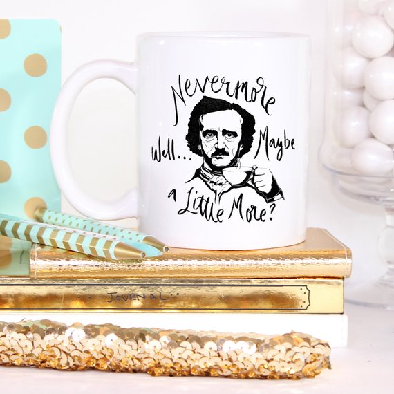 A high-quality 11 oz ceramic coffee mug featuring the phrase 'Nevermore' in a stylish design, perfect for Edgar Allan Poe fans.