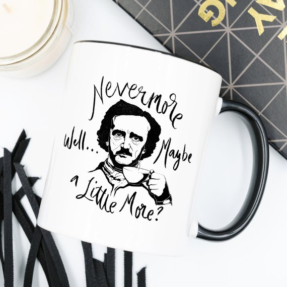 A high-quality 11 oz ceramic coffee mug featuring the phrase 'Nevermore' in a stylish design, perfect for Edgar Allan Poe fans.